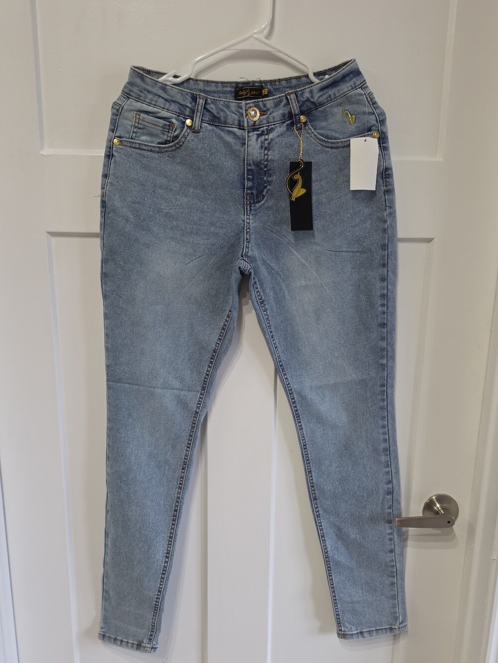 Baby Phat Light Wash Skinny Jeans with Gold Hardware
